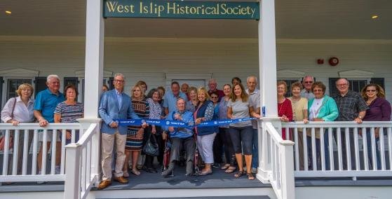 The ribbon cutting of the renovated LaGrange building in 2019. The LaGrange building houses the West Islip Historical Society.